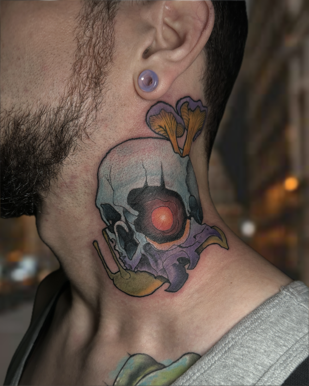 Color neotraditional mushroom skull neck tattoo